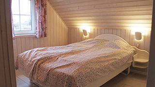 Schlafzimmer in Krattet Poolhus